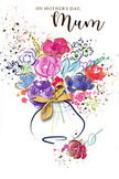 This Mother's Day card radiates the joyful energy of a fresh, hand-tied bouquet, yet it's all rendered in dreamy watercolour that feels perfectly at home in the artistic corners of Swiss Cottage and nearby Hampstead. The flowers themselves are a swirl of lush purples, playful pinks, radiant reds and soothing blues, with highlights of cerise and magenta that draw the eye to the heart of the arrangement. Each bloom is suggested rather than rigidly drawn, its petals outlined with quick, confident strokes of deep indigo that give shape without sacrificing the fluid charm of the medium. Delicate touches of gold pick out the edges of petals and leaves, adding a soft shimmer, as though the bouquet is catching golden evening light from a window overlooking Finchley Road. Scattered around the main cluster of flowers are tiny splashes of paint and subtle hearts, evoking petals tossed in the air after a celebration or drifting across the paths in nearby Primrose Hill. These light touches create a sense of movement and festivity while leaving plenty of calm white space. The stems appear to gather inside a gently curved vase, loosely painted with soft washes and finished with a neat golden bow at its neck, recalling the satin ribbon tied by a skilled florist just before delivery. The overall feeling is airy yet heartfelt, a paper bouquet full of colour, warmth and affectionate intent-perfect for sending Mother's Day love to mums across Swiss Cottage, Belsize Park and St John's Wood, whether as a standalone greeting or accompanying a real bouquet from Flower Delivery Swiss Cottage.